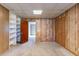 Finished basement with carpet, wood paneling, shelving and a closet at 752 Alison Jane Ne Ct, Kennesaw, GA 30144