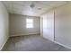 Bedroom featuring neutral walls, plush carpet, and natural light from a window at 752 Alison Jane Ne Ct, Kennesaw, GA 30144