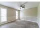 Bright bedroom featuring neutral walls and baseboard trim at 752 Alison Jane Ne Ct, Kennesaw, GA 30144
