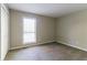 Spacious bedroom with large window and ample natural light at 752 Alison Jane Ne Ct, Kennesaw, GA 30144