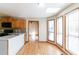 Sunny breakfast nook area off of the kitchen with hardwood floors and large windows with natural light at 752 Alison Jane Ne Ct, Kennesaw, GA 30144