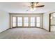 Light-filled living room with bay windows provides ample natural light and great outdoor views at 752 Alison Jane Ne Ct, Kennesaw, GA 30144