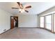 Large living room with a staircase and a wall of windows with great natural light at 752 Alison Jane Ne Ct, Kennesaw, GA 30144