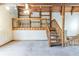 Lofted living room with ceiling fan and exposed beams at 752 Alison Jane Ne Ct, Kennesaw, GA 30144