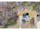 An aerial view showcasing the property's spacious layout and surrounding greenery at 76 Riverbend Trl, Douglasville, GA 30134