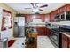 Spacious kitchen featuring stainless steel appliances and plenty of cabinet space at 76 Riverbend Trl, Douglasville, GA 30134