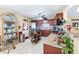 Well-equipped kitchen with stainless steel appliances, granite countertops, and a kitchen island at 76 Riverbend Trl, Douglasville, GA 30134