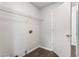 Laundry room featuring wood-look floor and shelving at 900 Oakhill Sw Ave, Atlanta, GA 30310