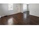Living room with rich hardwood floors and ample natural light at 900 Oakhill Sw Ave, Atlanta, GA 30310