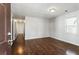 Bright living room with hardwood floors and a view to hall at 900 Oakhill Sw Ave, Atlanta, GA 30310