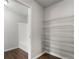 Ample storage space with white wire shelving and wood-look floors at 900 Oakhill Sw Ave, Atlanta, GA 30310
