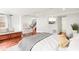 This bedroom has hardwood floors and a comfortable sleeping area at 106 Maple St, Roswell, GA 30075