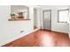 Bonus room featuring wood floors, neutral walls, access to a deck and an interior window at 106 Maple St, Roswell, GA 30075