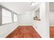 Bright bonus room with hardwood floors, neutral walls, and lots of natural light from two windows at 106 Maple St, Roswell, GA 30075