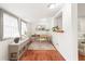 Bright home office with a wooden desk, natural light, and neutral decor for a productive workspace at 106 Maple St, Roswell, GA 30075