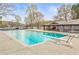Outdoor pool featuring diving boards with a lake view at 106 Maple St, Roswell, GA 30075