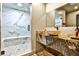 Spa-like bathroom with marble walk-in shower, stone vessel sink, and decorative tile at 237 Webney Se Dr, Marietta, GA 30068