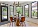 Charming breakfast nook with bay windows and modern lighting at 237 Webney Se Dr, Marietta, GA 30068