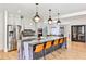 Spacious kitchen with stainless appliances, island with seating, and wine storage at 237 Webney Se Dr, Marietta, GA 30068