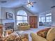 Inviting living room with vaulted ceiling, fireplace, and an open layout for comfortable living at 2730 Vintage Reserve Ln, Marietta, GA 30066
