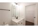 Bathroom featuring a vanity, modern fixture and a closet at 6569 Beacon Dr, Sandy Springs, GA 30328