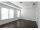 Spacious bedroom with natural light and hardwood flooring at 6569 Beacon Dr, Sandy Springs, GA 30328
