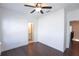 A bedroom showcasing hardwood floors and direct access to an ensuite bathroom at 6569 Beacon Dr, Sandy Springs, GA 30328
