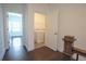 Convenient laundry room features white washer, dryer, and shelving at 6569 Beacon Dr, Sandy Springs, GA 30328