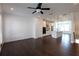Open-concept living space flowing into a kitchen with an island, offering modern living at 6569 Beacon Dr, Sandy Springs, GA 30328