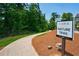 Scenic nature trail surrounded by lush greenery and mature trees in a desirable community at 6569 Beacon Dr, Sandy Springs, GA 30328