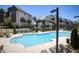 Stunning community pool surrounded by luxurious townhomes and lush landscaping at 6569 Beacon Dr, Sandy Springs, GA 30328