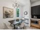 Cozy dining area featuring a modern chandelier, stylish art, and a view of outdoors at 1792 Charles Nw Pl, Atlanta, GA 30318