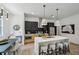 Modern kitchen with large island, bar stool seating, and stainless steel appliances at 1792 Charles Nw Pl, Atlanta, GA 30318
