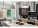 Stylish kitchen with a large island, stainless steel appliances, and sleek cabinetry at 1792 Charles Nw Pl, Atlanta, GA 30318