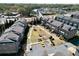 Birds-eye view of an orderly neighborhood featuring homes, green spaces, and parking at 3022 Hartford Mill, Duluth, GA 30097