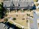 Aerial view of townhomes with manicured green space, walking paths, and convenient parking at 3022 Hartford Mill, Duluth, GA 30097