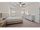 Bedroom with neutral colors and tray ceiling at 3022 Hartford Mill, Duluth, GA 30097