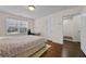 This bedroom has a desk, a bed and an ensuite bathroom at 3022 Hartford Mill, Duluth, GA 30097
