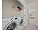 Laundry room with modern washer and dryer at 3022 Hartford Mill, Duluth, GA 30097