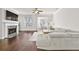 Bright living room boasts an open layout, fireplace, and hardwood floors, ideal for entertaining at 3022 Hartford Mill, Duluth, GA 30097