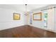 Bright dining room with hardwood floors, chandelier and natural light at 4720 Timberland Sw Dr, Mableton, GA 30126
