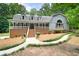 Charming house with brick foundation, well-manicured yard, and a welcoming front porch at 4720 Timberland Sw Dr, Mableton, GA 30126