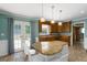 Well-lit kitchen features a center island, granite countertops, and stainless appliances at 4720 Timberland Sw Dr, Mableton, GA 30126
