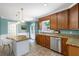 Kitchen featuring stainless steel appliances, island, and a view to the backyard at 4720 Timberland Sw Dr, Mableton, GA 30126