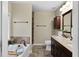 Well-appointed bathroom with double vanity, soaking tub, and modern fixtures at 522 Bass Nw Pointe, Kennesaw, GA 30144
