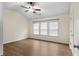 Spacious bedroom features vaulted ceiling, ample natural light and hard wood flooring at 522 Bass Nw Pointe, Kennesaw, GA 30144