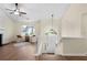 Entryway features hardwood floors, staircase, and living room with lots of natural light at 522 Bass Nw Pointe, Kennesaw, GA 30144