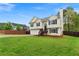 Charming two-story home featuring a spacious yard, a two-car garage, and traditional architecture at 522 Bass Nw Pointe, Kennesaw, GA 30144