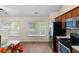 Bright kitchen area featuring stainless steel appliances and ample natural light at 522 Bass Nw Pointe, Kennesaw, GA 30144