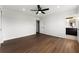 The bedroom features a ceiling fan, wood-look laminate floors and an ensuite bathroom at 801 Arbor Hill Dr, Stone Mountain, GA 30088